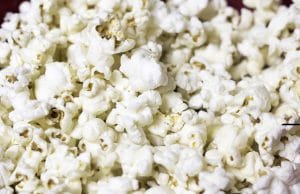 Close-up of fluffy white popcorn kernels piled together.