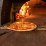 La pizza italiana mantiene su lugar en las mesas españolas